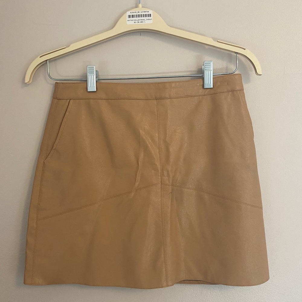 Nude faux leather mini skirt